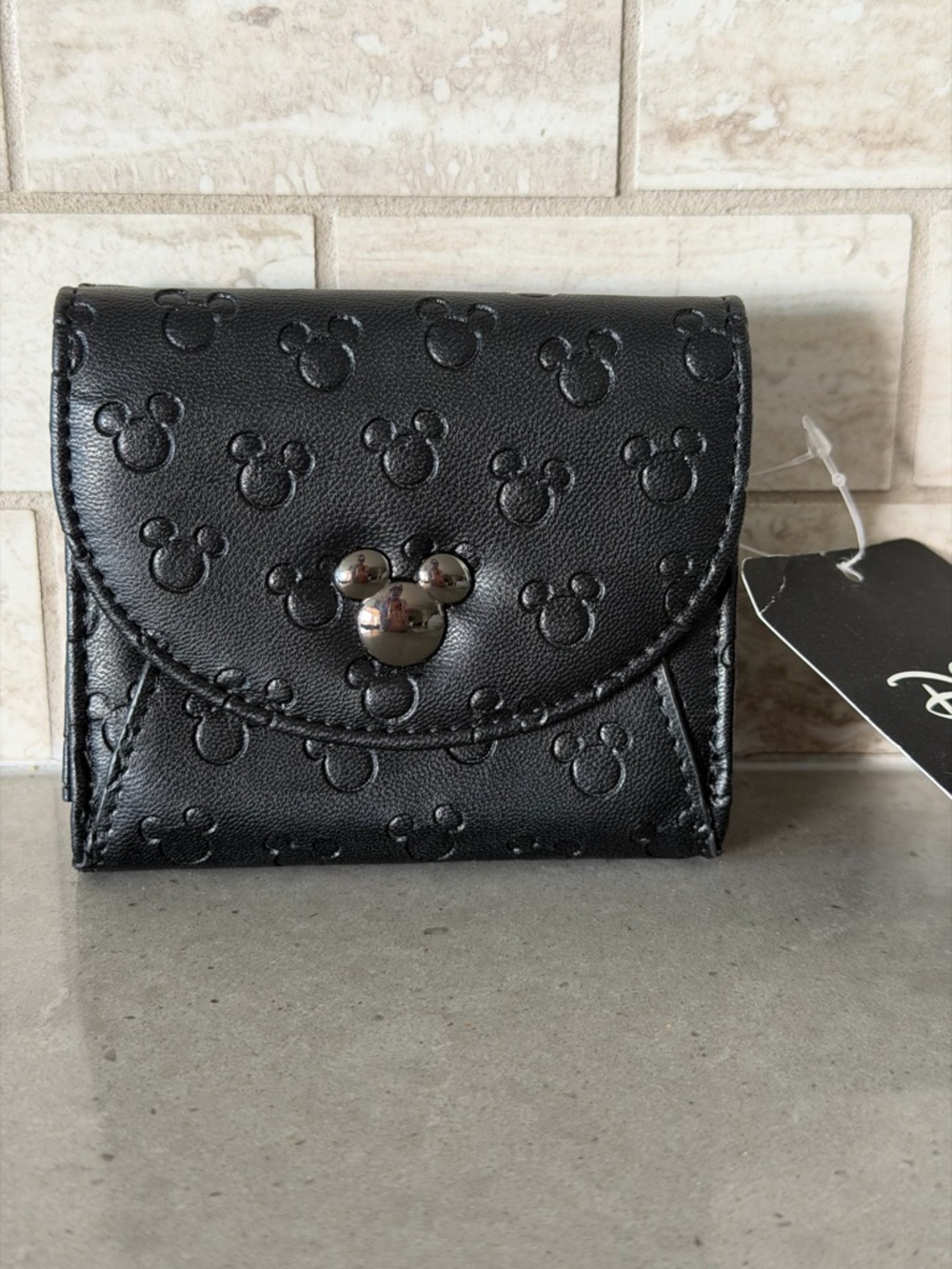 NWT Disney Black Embossed Mickey Head Mini Wallet